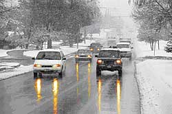 cars on a road in snow